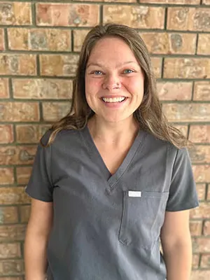A dental assistant on the Abby Dental Care team