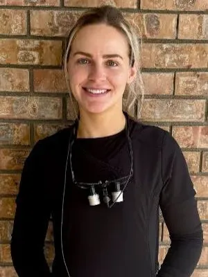 A hygienist on the Abby Dental Care team