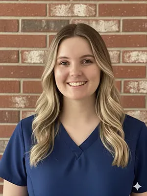 A dental assistant on the Abby Dental Care team