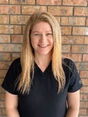 A hygienist on the Abby Dental Care team