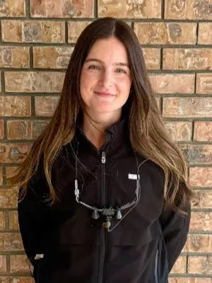 A hygienist on the Abby Dental Care team